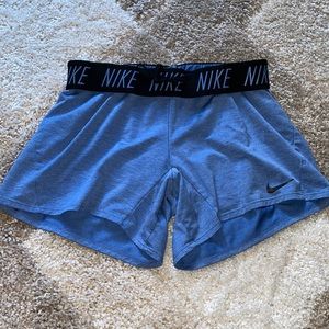 Super cute baby blue nike track shorts
